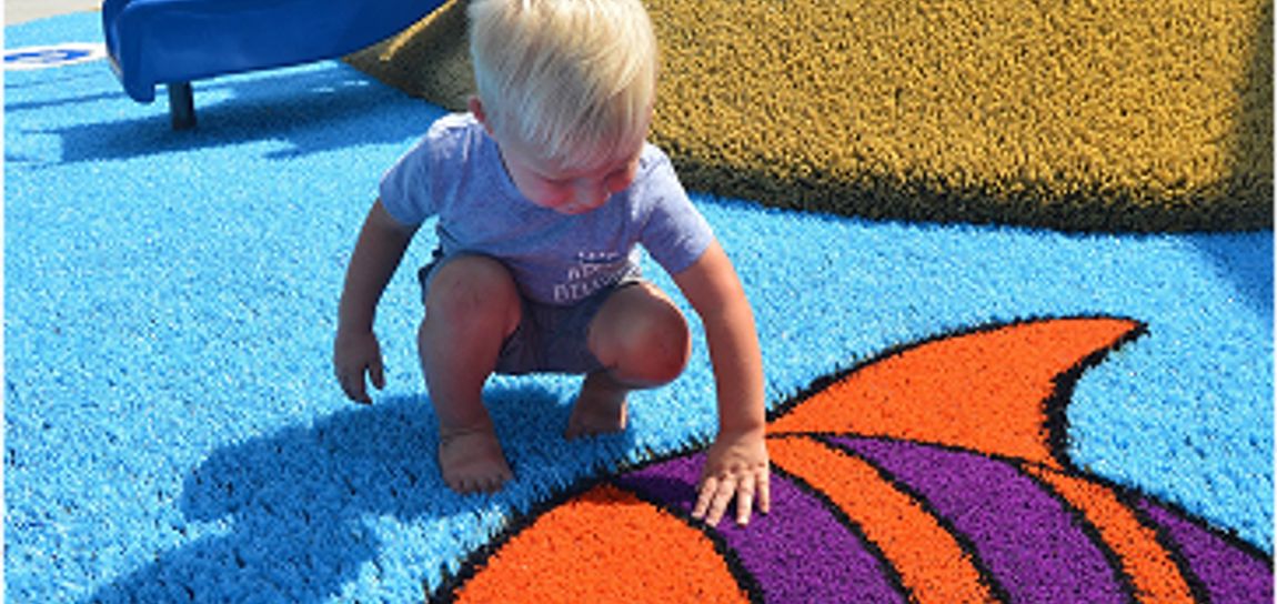 Little kid on turf