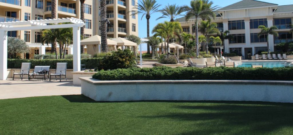 Artificial grass installed in a hotel courtyard.