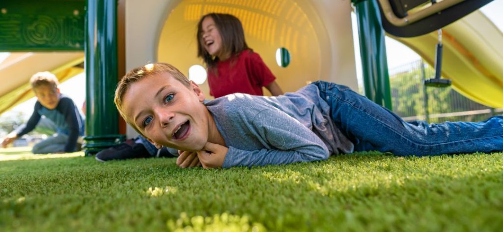 Artificial Grass Vs. Natural Grass for Playgrounds